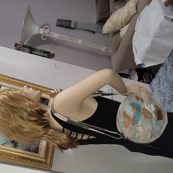Canvas round crossbody purse. Has splashes of color. - Picture 4 of 10